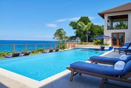 Tropical-Inspired 5BR Modern Seafront Villa | Infinity Pool & Direct Sea Access - Image 3